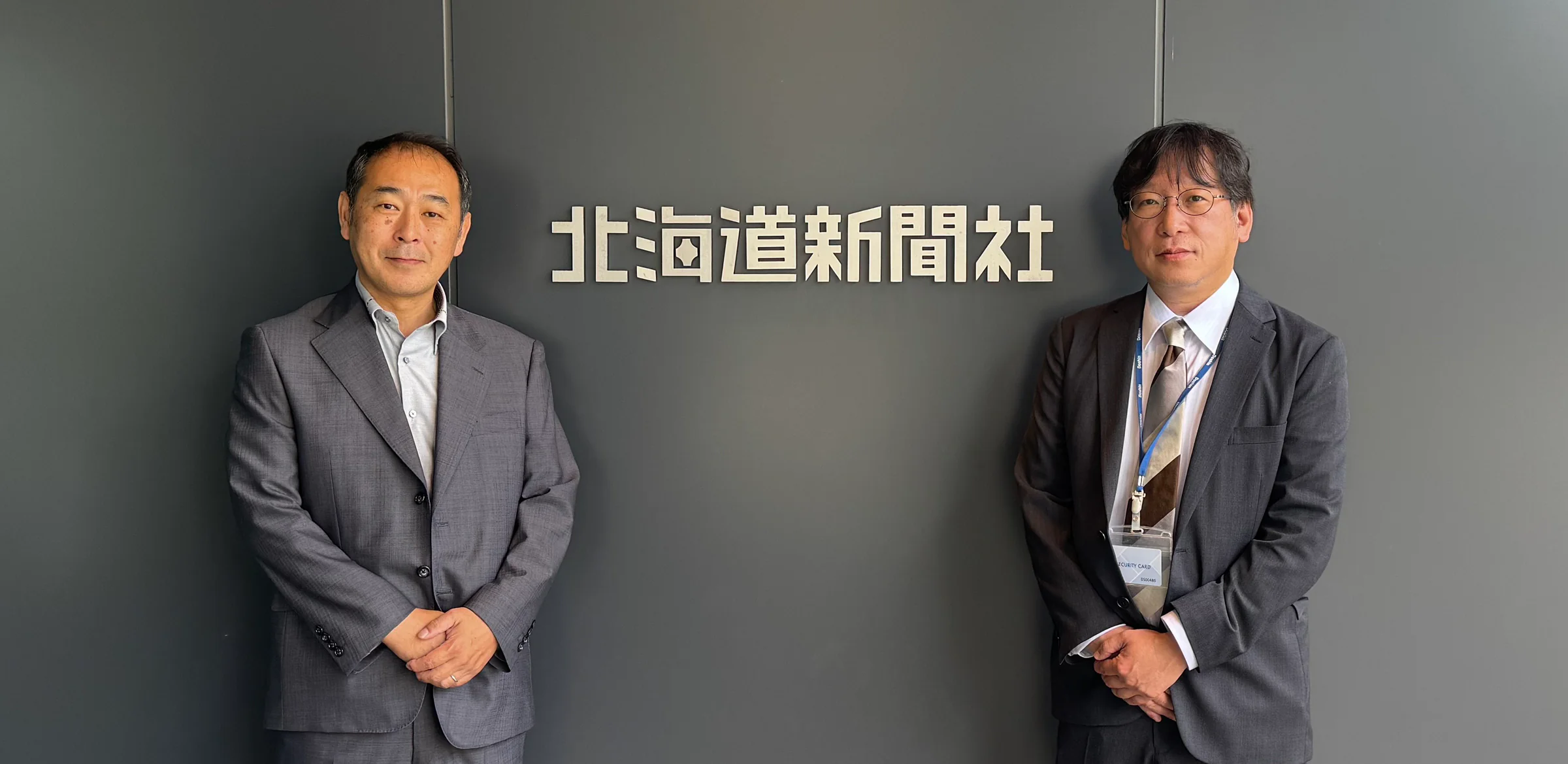 `北海道新聞社`